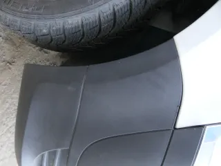 VW Fox 5Z Stoßstange vorne Stoßfänger schwarz mit Grill - Bild 2