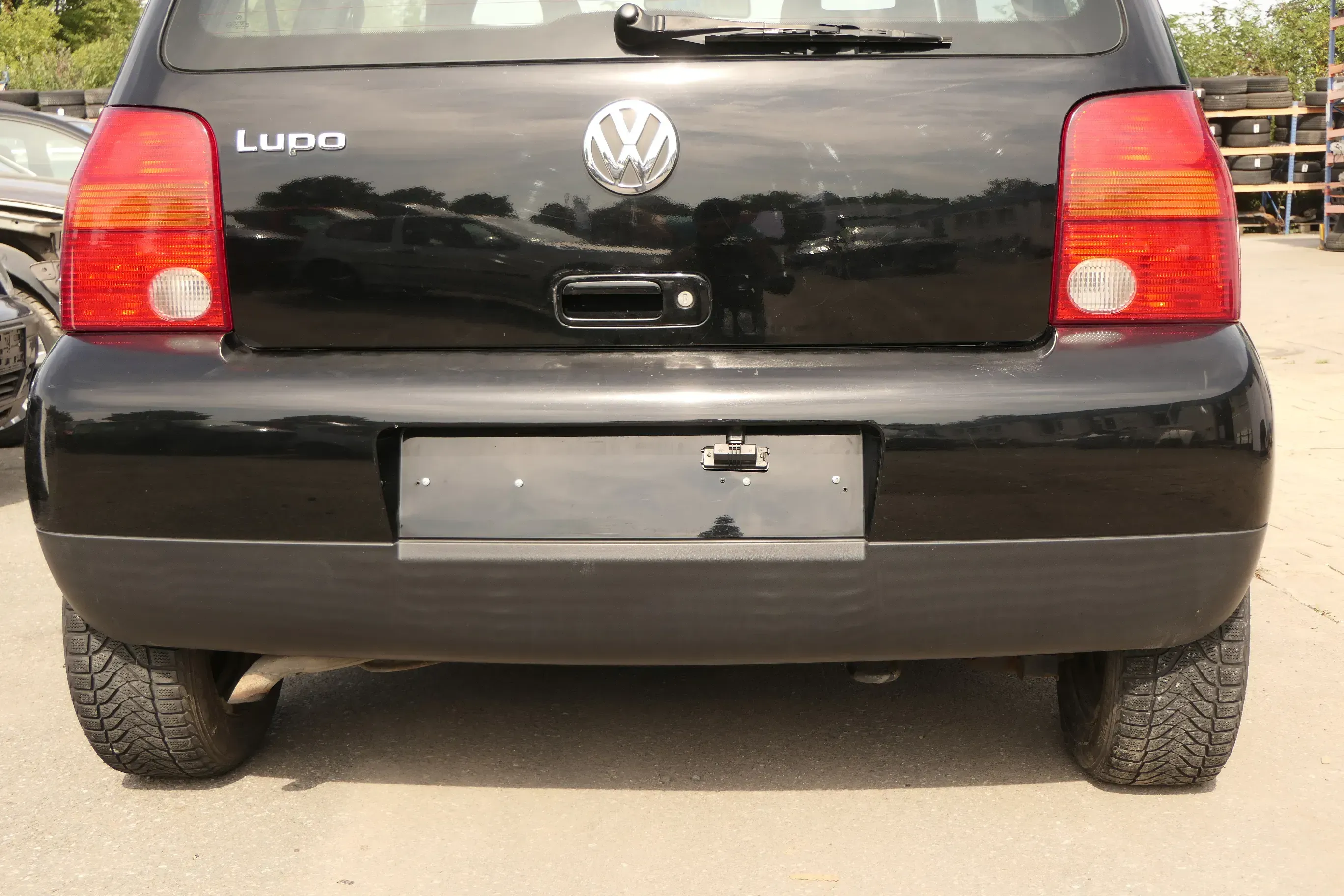 VW Lupo Stoßstange hinten Heckstoßstange Stoßfänger schwarz L041 uni 159833 - Bild 1