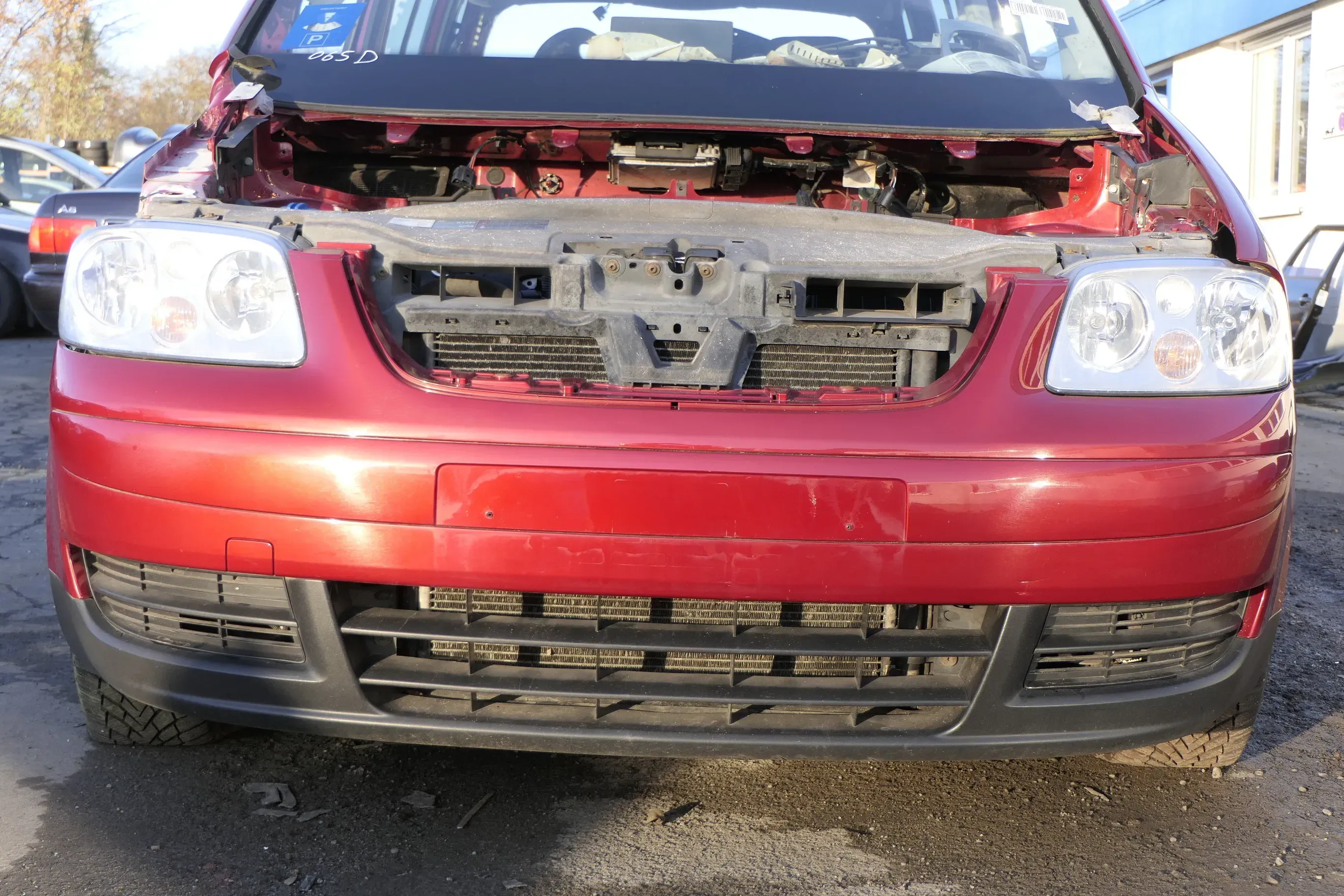 VW Touran 1T Stoßstange vorne Frontstoßstange Stoßfänger wein-rot braun LA3W red - Bild 1