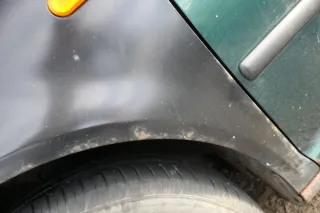 VW Golf 4 1J Kotflügel vorne links schwarz Rost - Bild 5