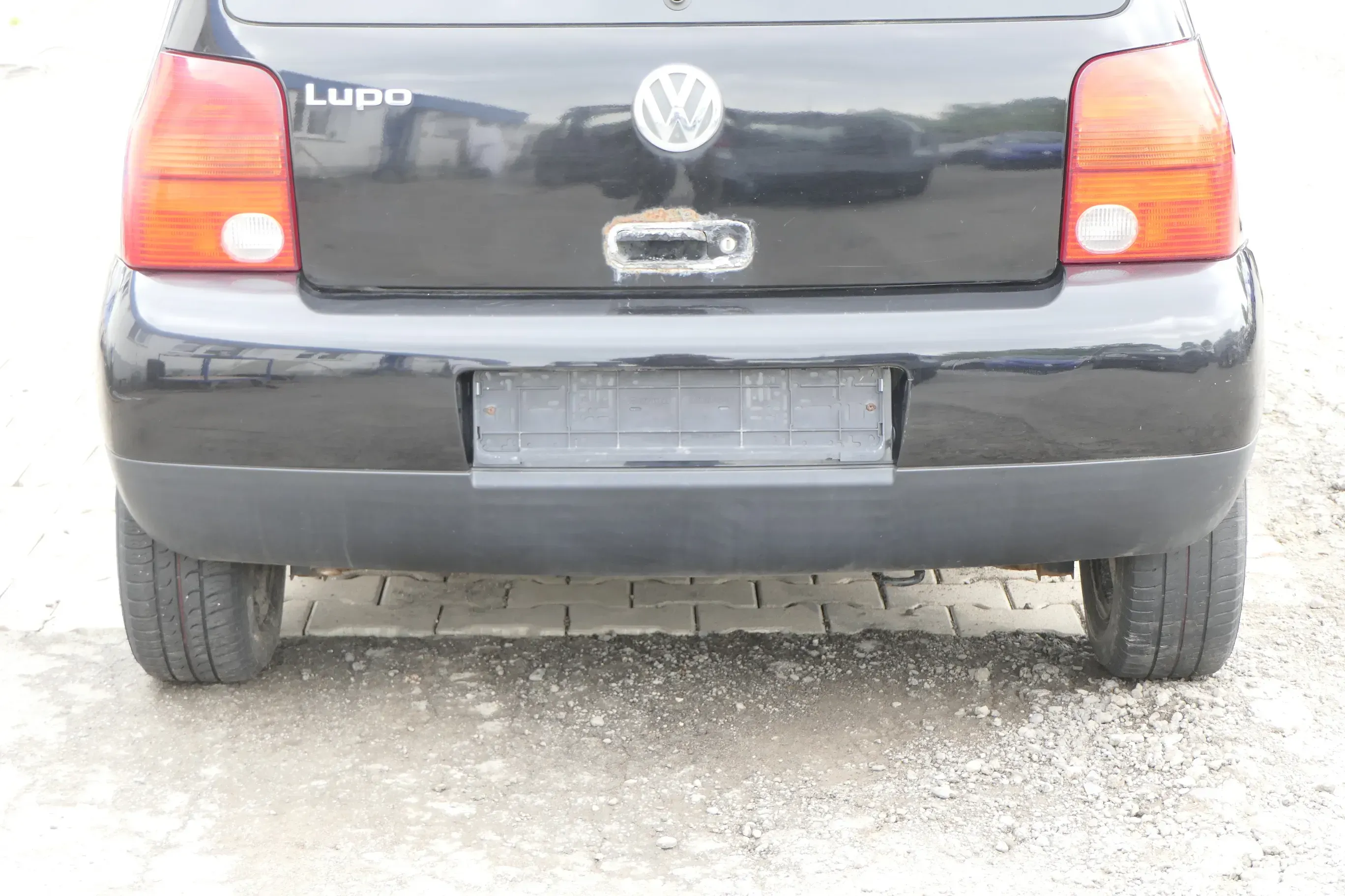 VW Lupo Stoßstange hinten Heckstoßstange Stoßfänger schwarz L041 - Bild 1