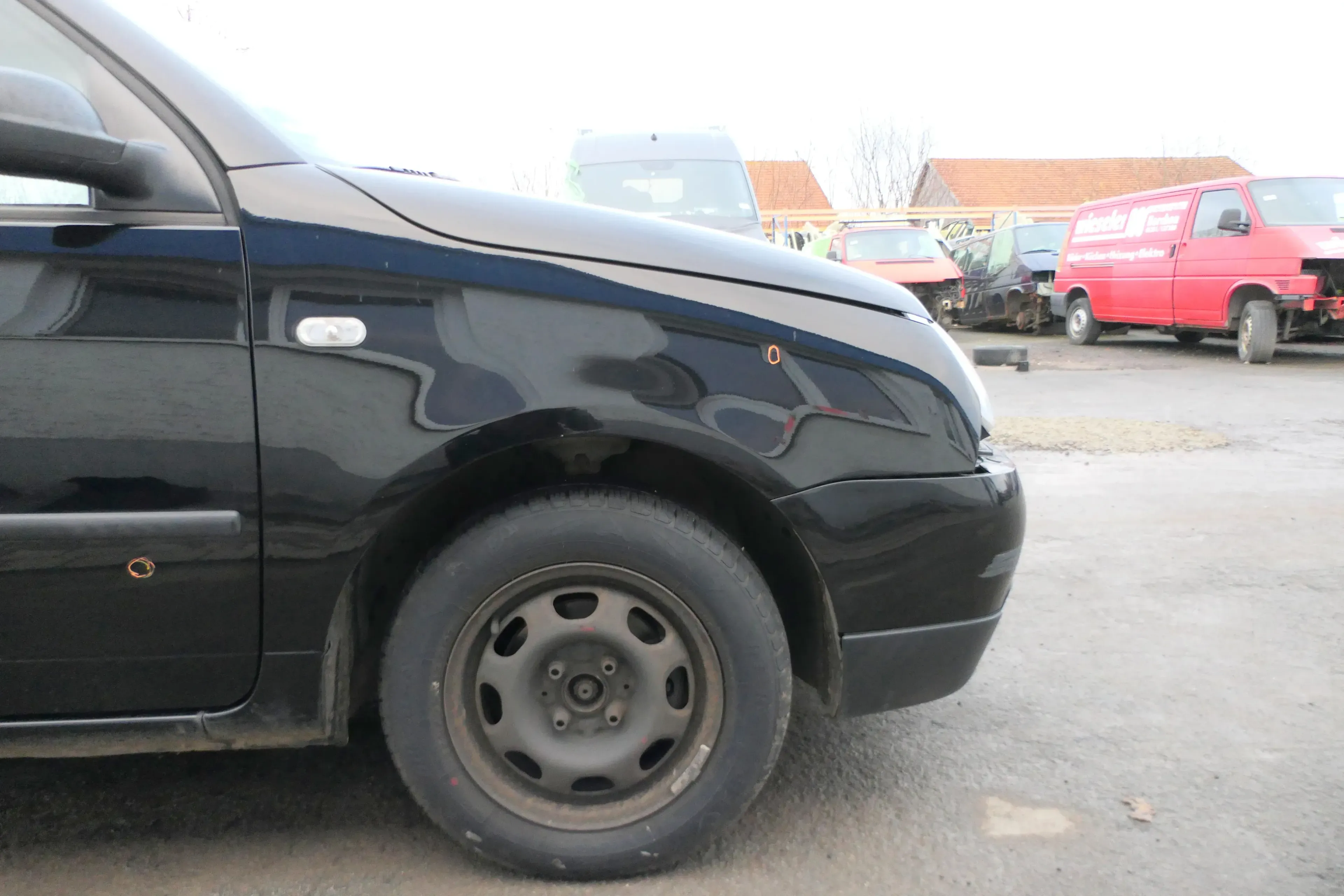 VW Lupo Kotflügel vorne rechts schwarz L041 uni 162081 - Bild 1