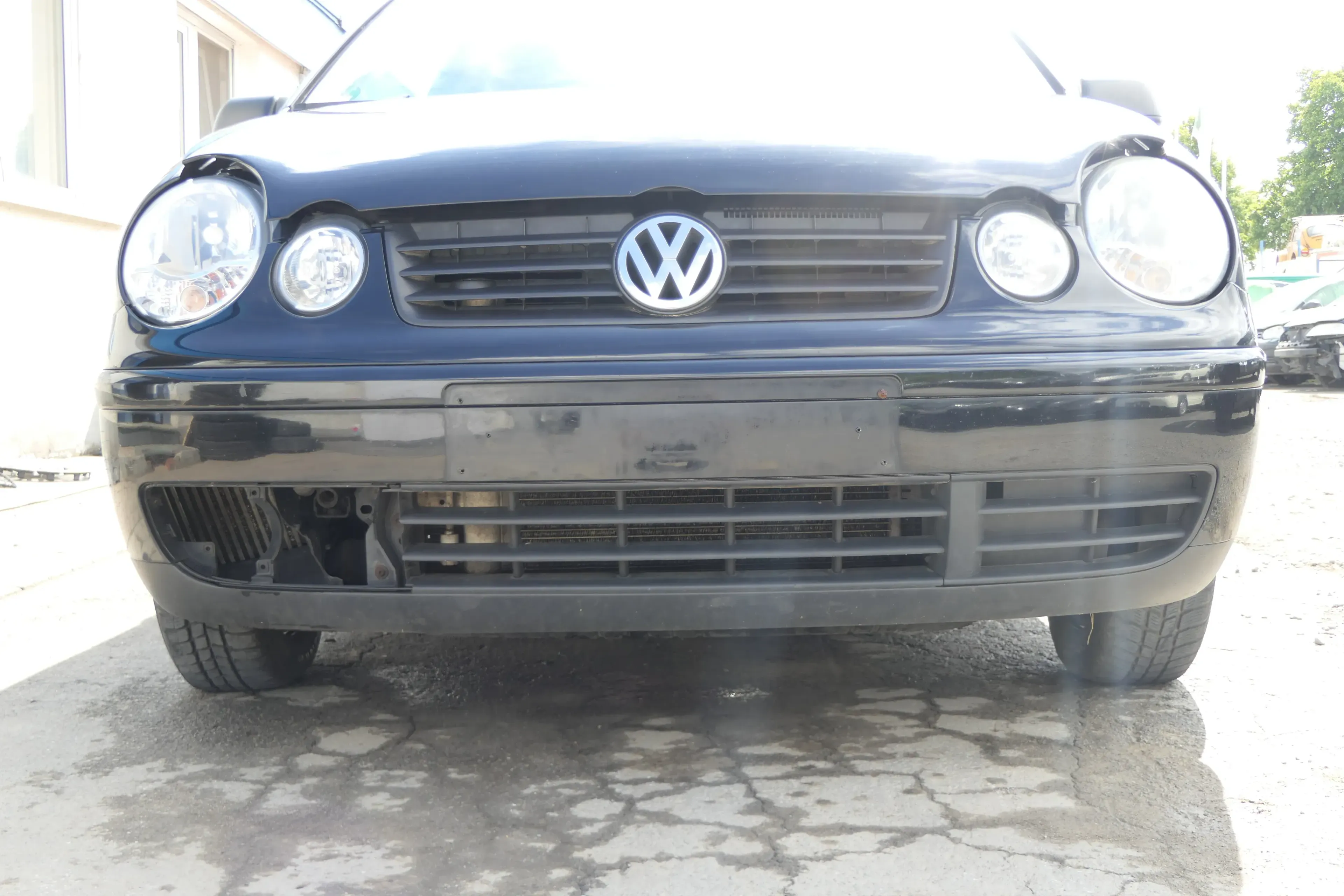 VW Polo 9N Stoßstange Frontstoßstange vorne schwarz L041 + Grill - Bild 1