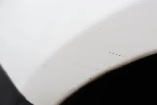 VW Fox Kotflügel vorne links weiß LB9A - Delle - Bild 2