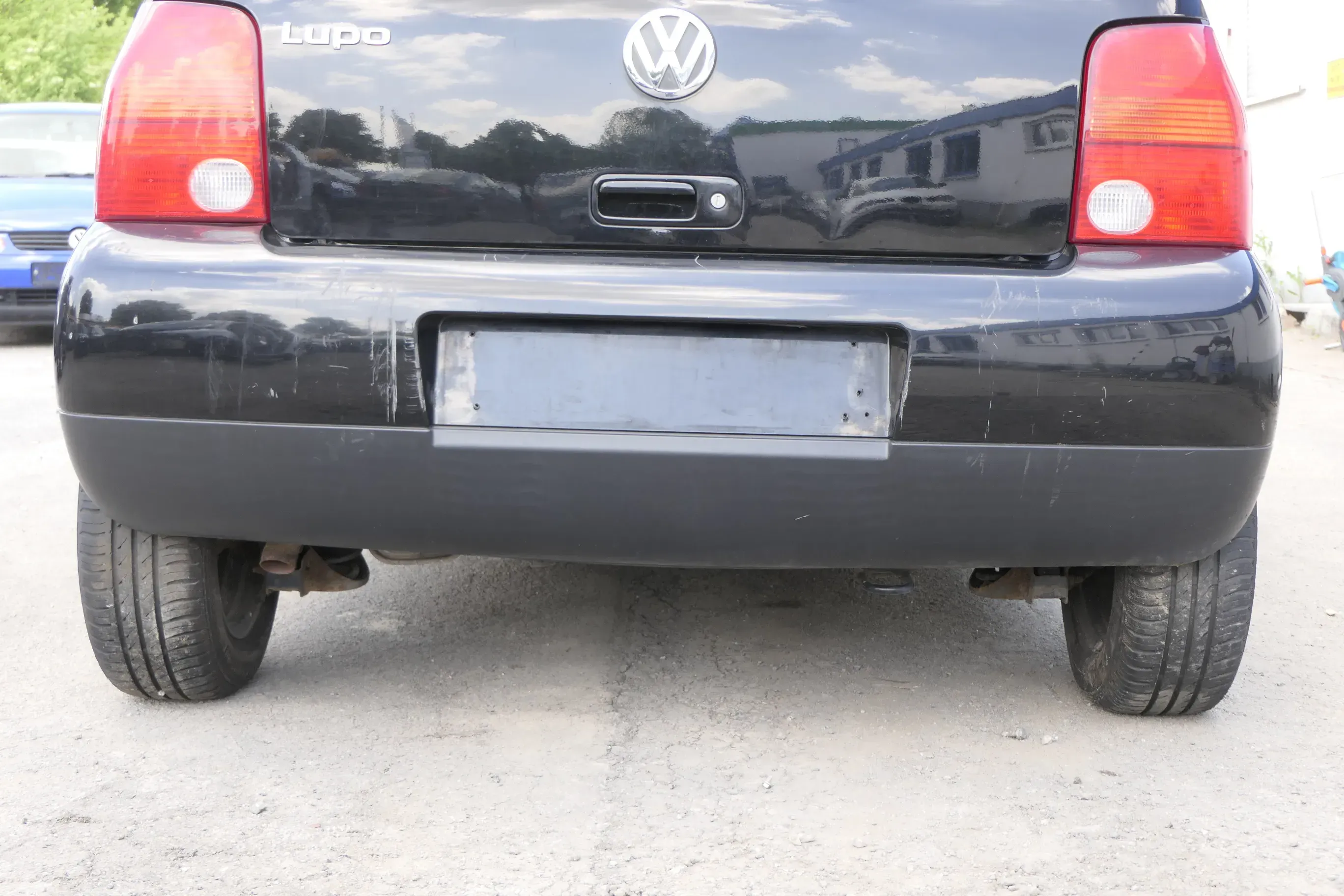 VW Lupo Stoßstange hinten Heckstoßstange Stoßfänger schwarz L041 uni - Bild 1