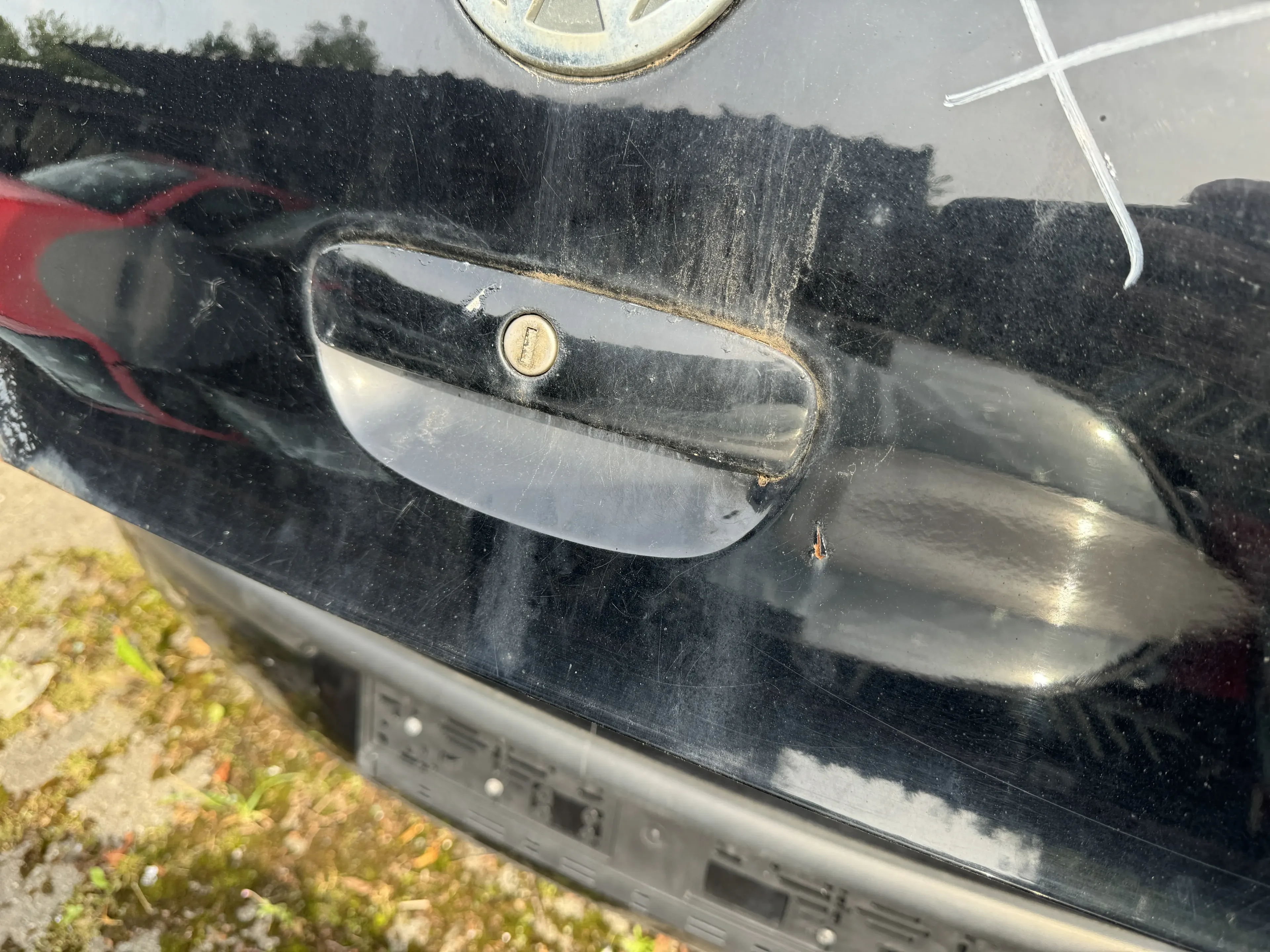 VW Polo 9N 9N3 Griff Heckkklappe Heckklappengriff schwarz L041 - Bild 1