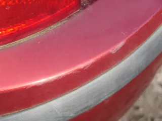 Skoda Fabia 6Y Kombi Stufenhec Stoßstange hinten Heckstoßstange rot braun LF3T - Bild 14