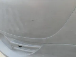 VW Fox 5Z Stoßstange vorne Stoßfänger schwarz mit Grill - Bild 3